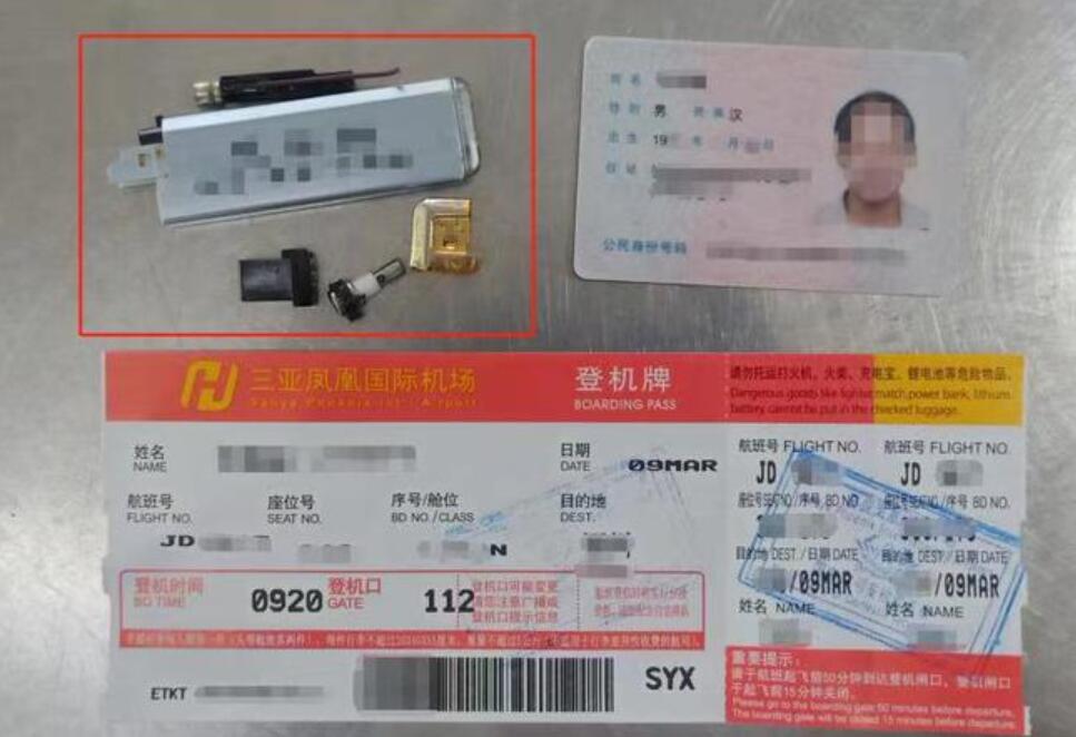 三亞機場安檢門檢測人員發現違禁拆分隱匿打火機[圖]